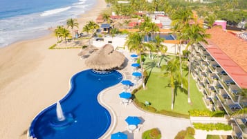 Relax by the ocean with access to the pool from your balcony.