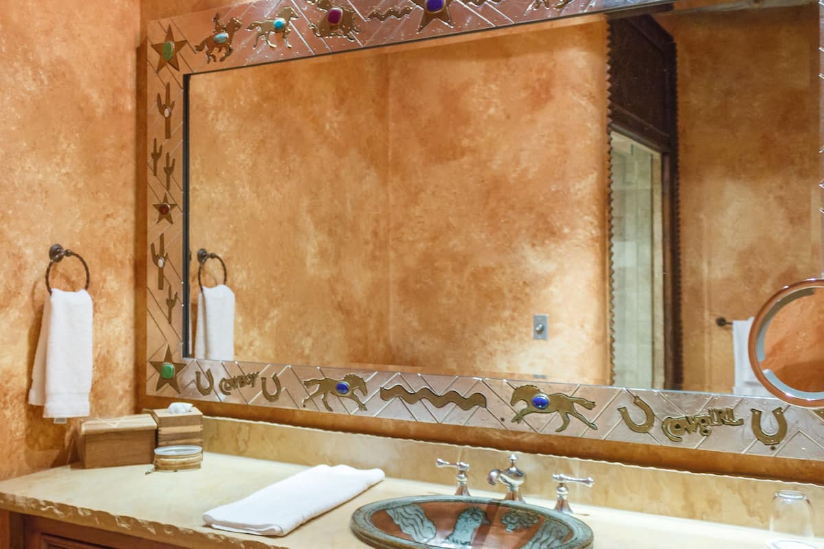 suite, 1 king bed, mountain view (premier suite) | bathroom | designer toiletries, hair dryer, bathrobes, slippers