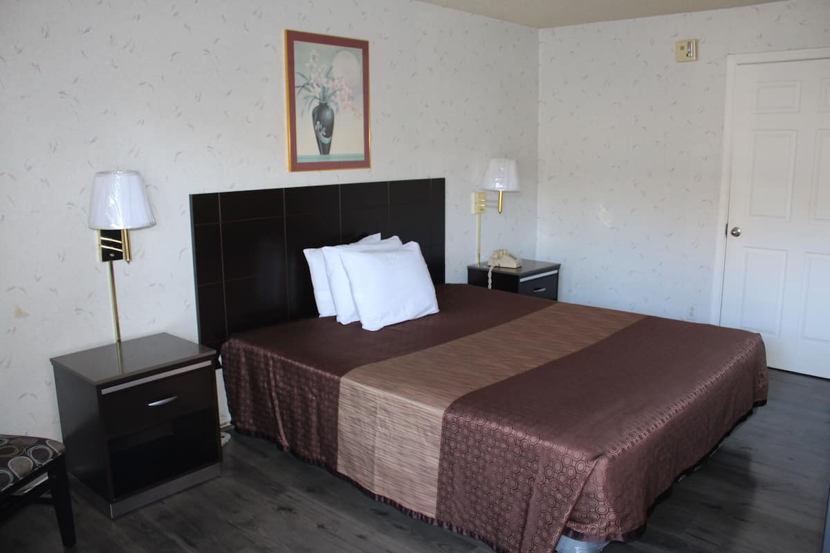 Habitación, 1 cama Queen size, para no fumadores | Escritorio, wifi gratis y ropa de cama