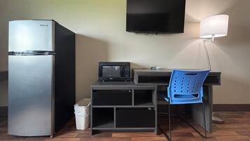 Desk, blackout drapes, iron/ironing board, free cribs/infant beds