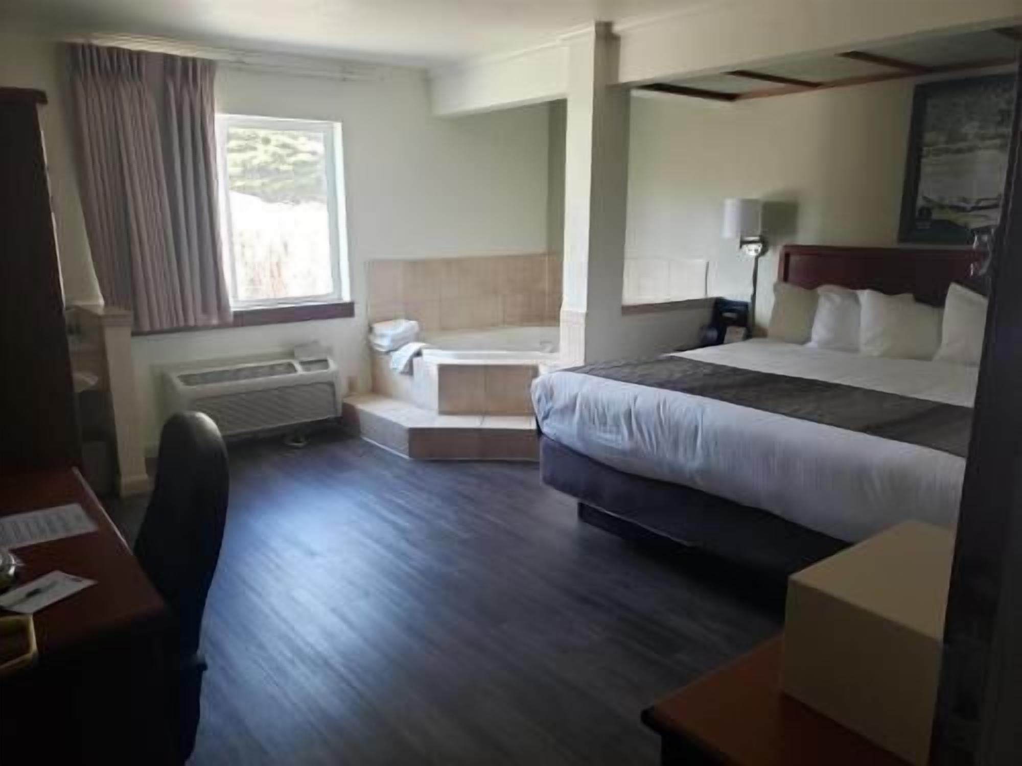 Desk, blackout drapes, iron/ironing board, rollaway beds