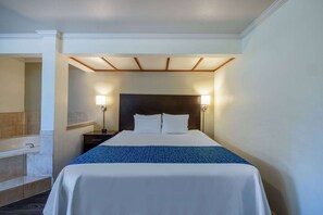 Suite, 1 King Bed, Non Smoking | Desk, blackout drapes, iron/ironing board, rollaway beds