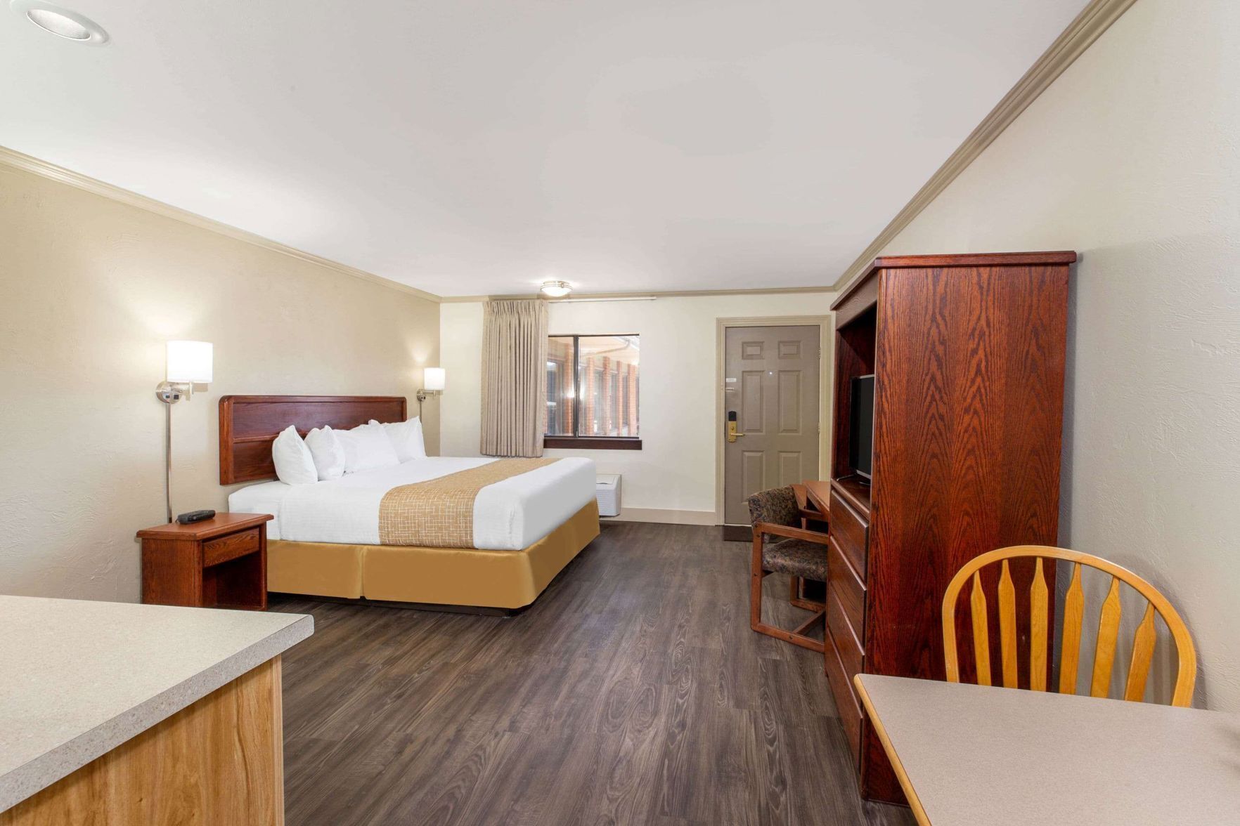 Desk, blackout drapes, iron/ironing board, rollaway beds