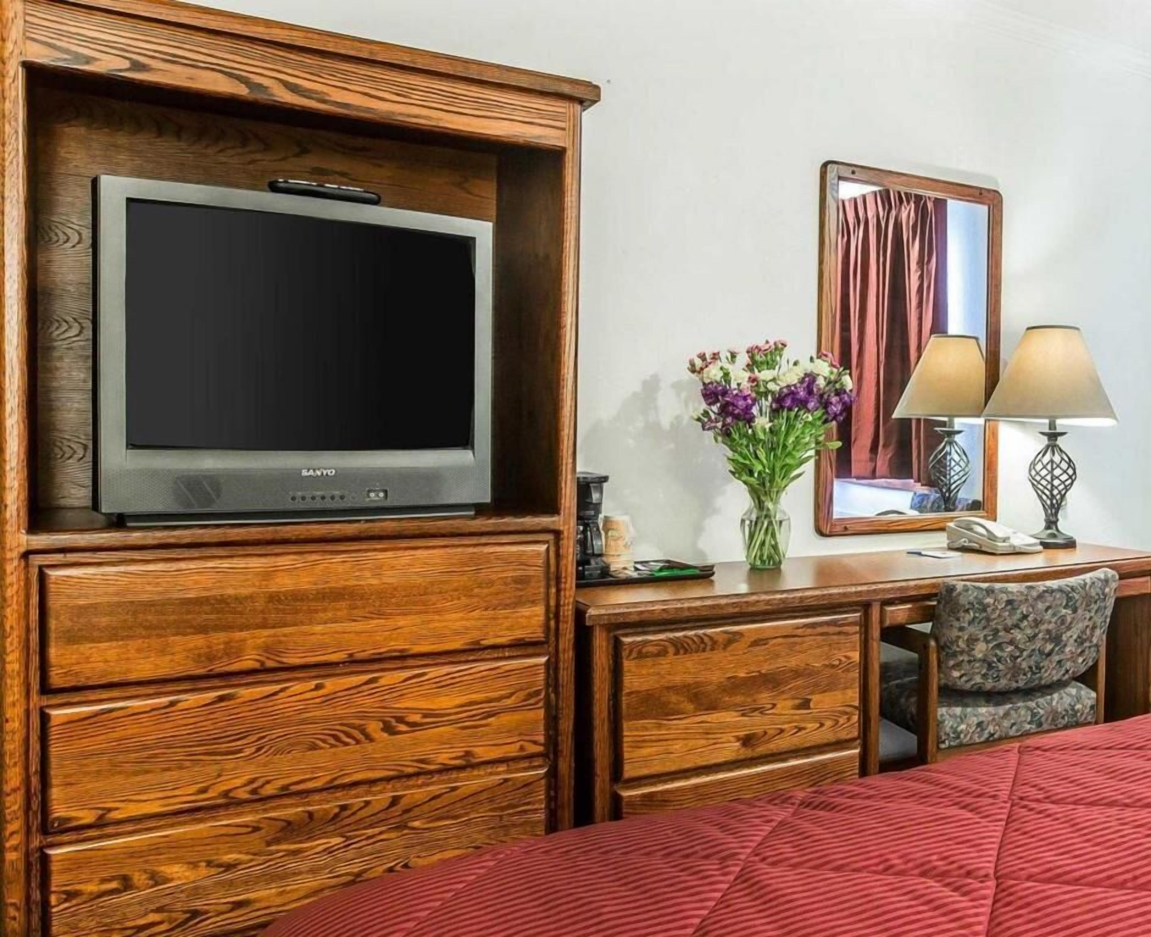 Desk, blackout curtains, iron/ironing board, rollaway beds