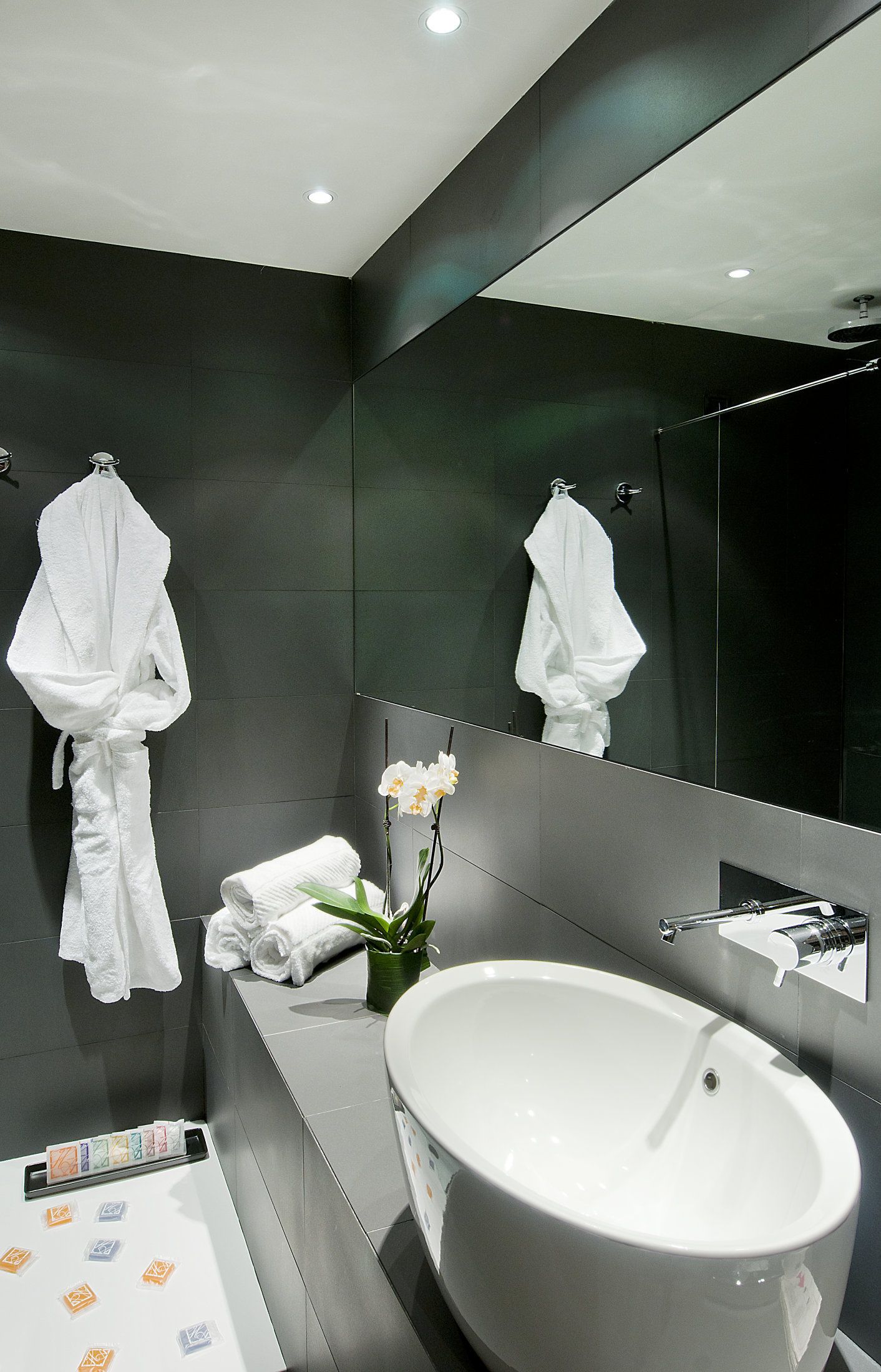 rainfall showerhead, free toiletries, hair dryer, slippers