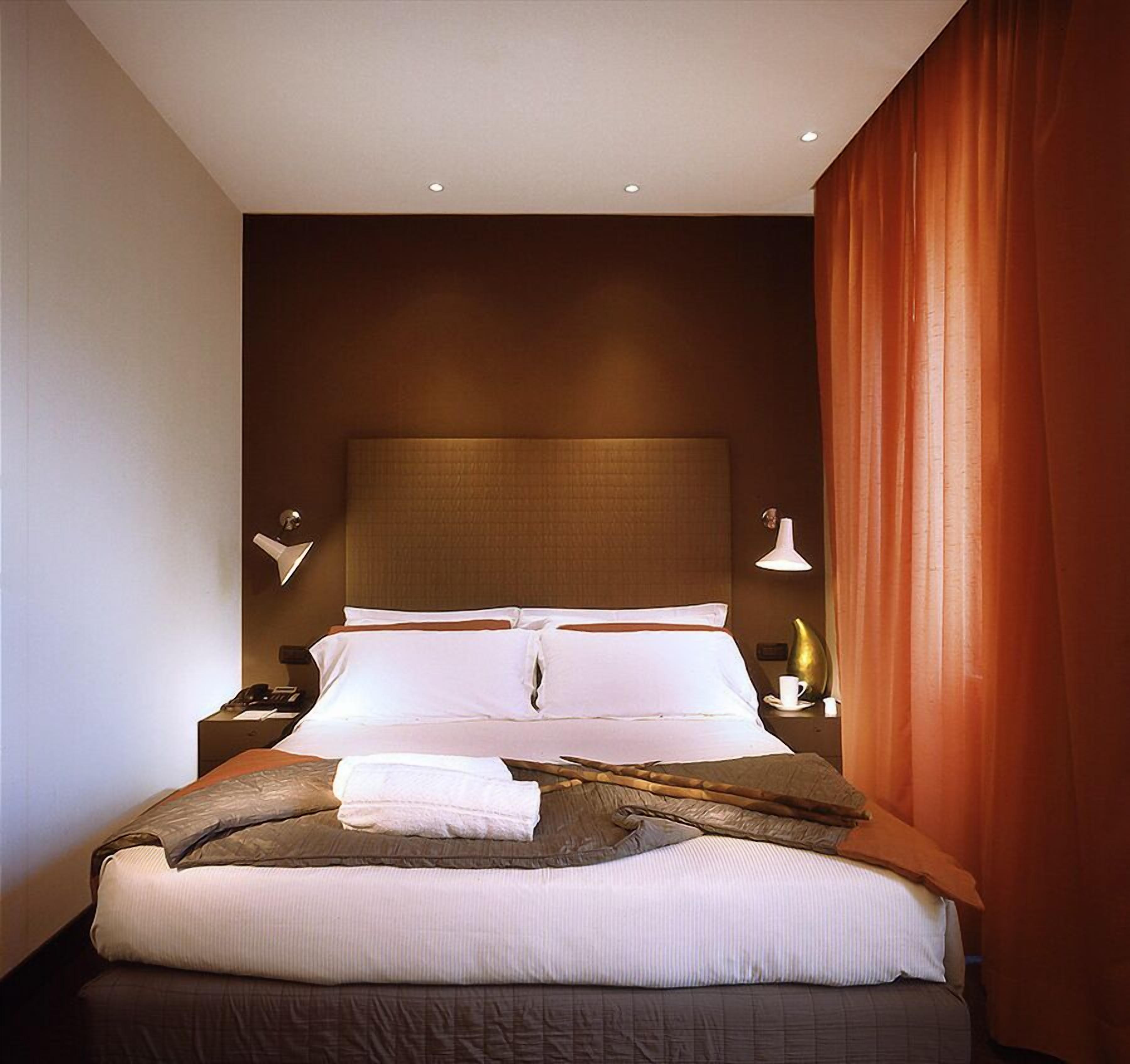 standard double or twin room | premium bedding, down duvets, memory-foam beds, minibar