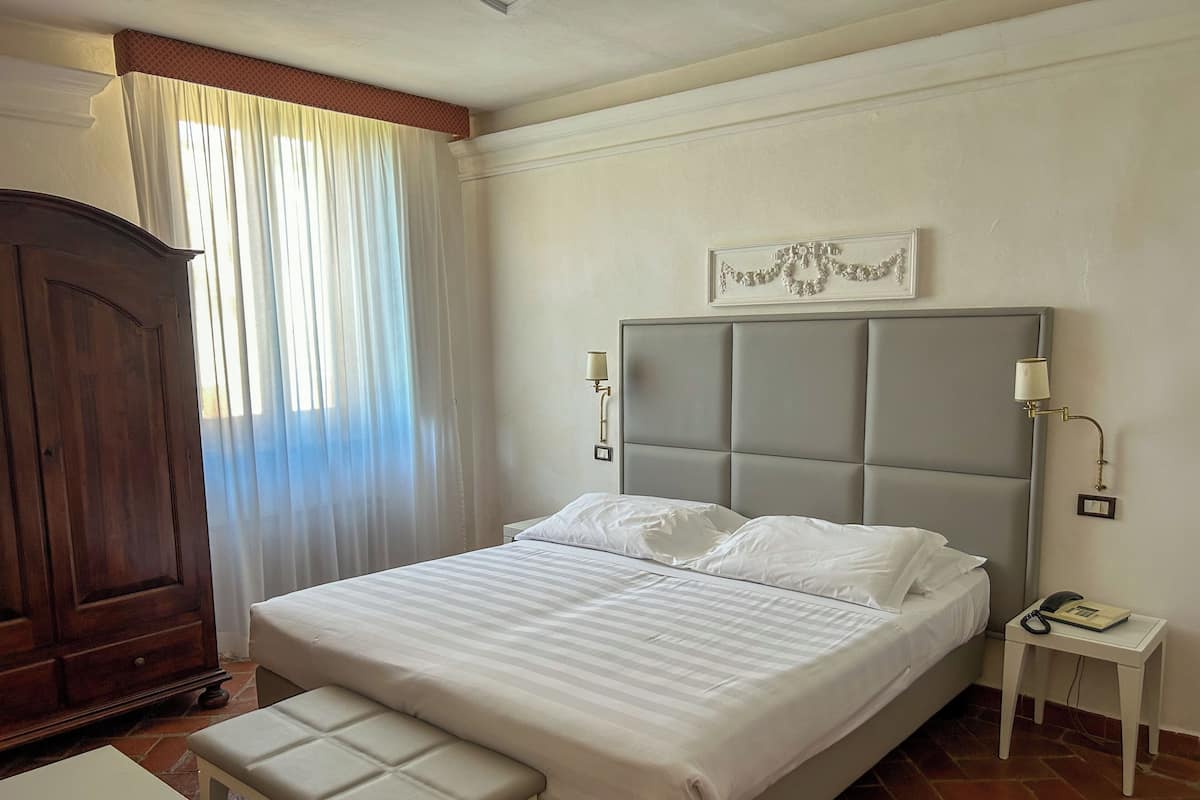Premium bedding, down duvets, in-room safe, desk