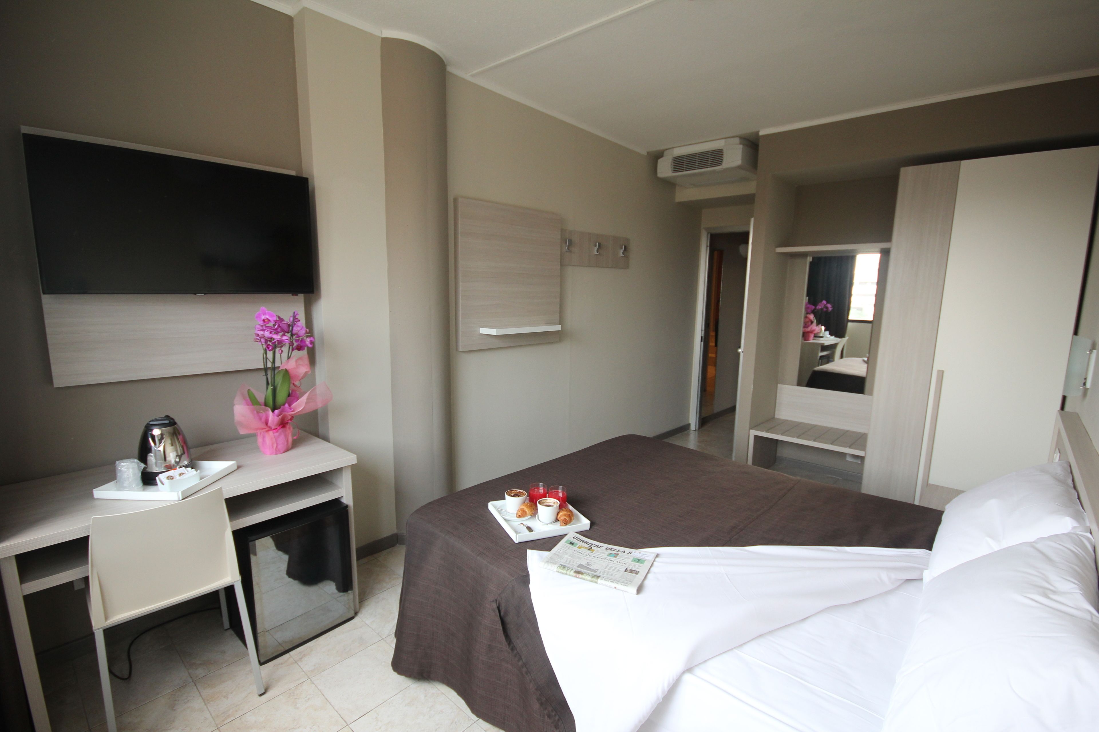 frette italian sheets, premium bedding, down duvets, in-room safe