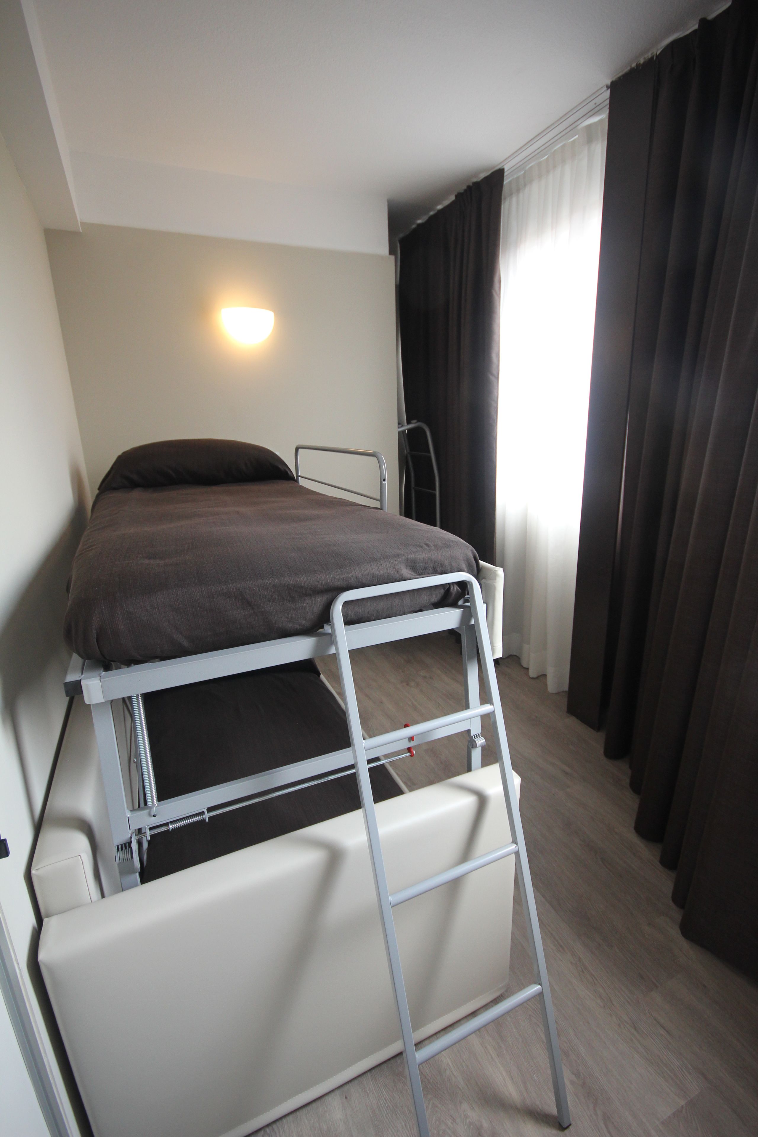 quadruple room | frette italian sheets, premium bedding, down duvets, in-room safe