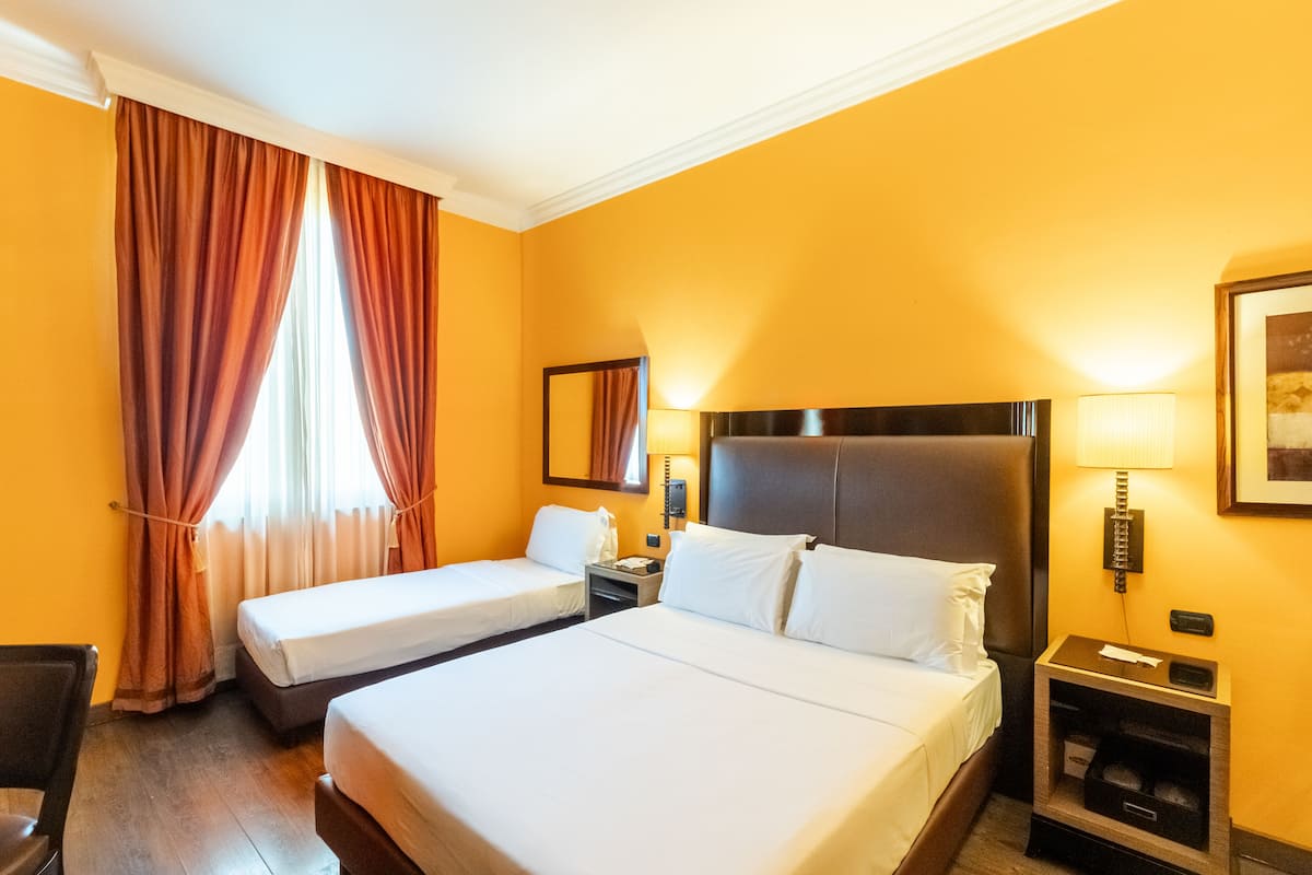 Superior Triple Room | 1 bedroom, in-room safe, desk, laptop workspace
