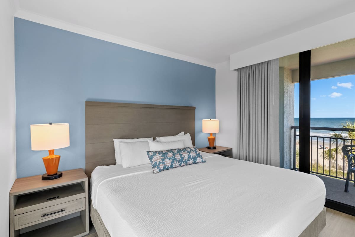 Oceanfront Deluxe King Suite | 1 bedroom, in-room safe, blackout drapes, iron/ironing board