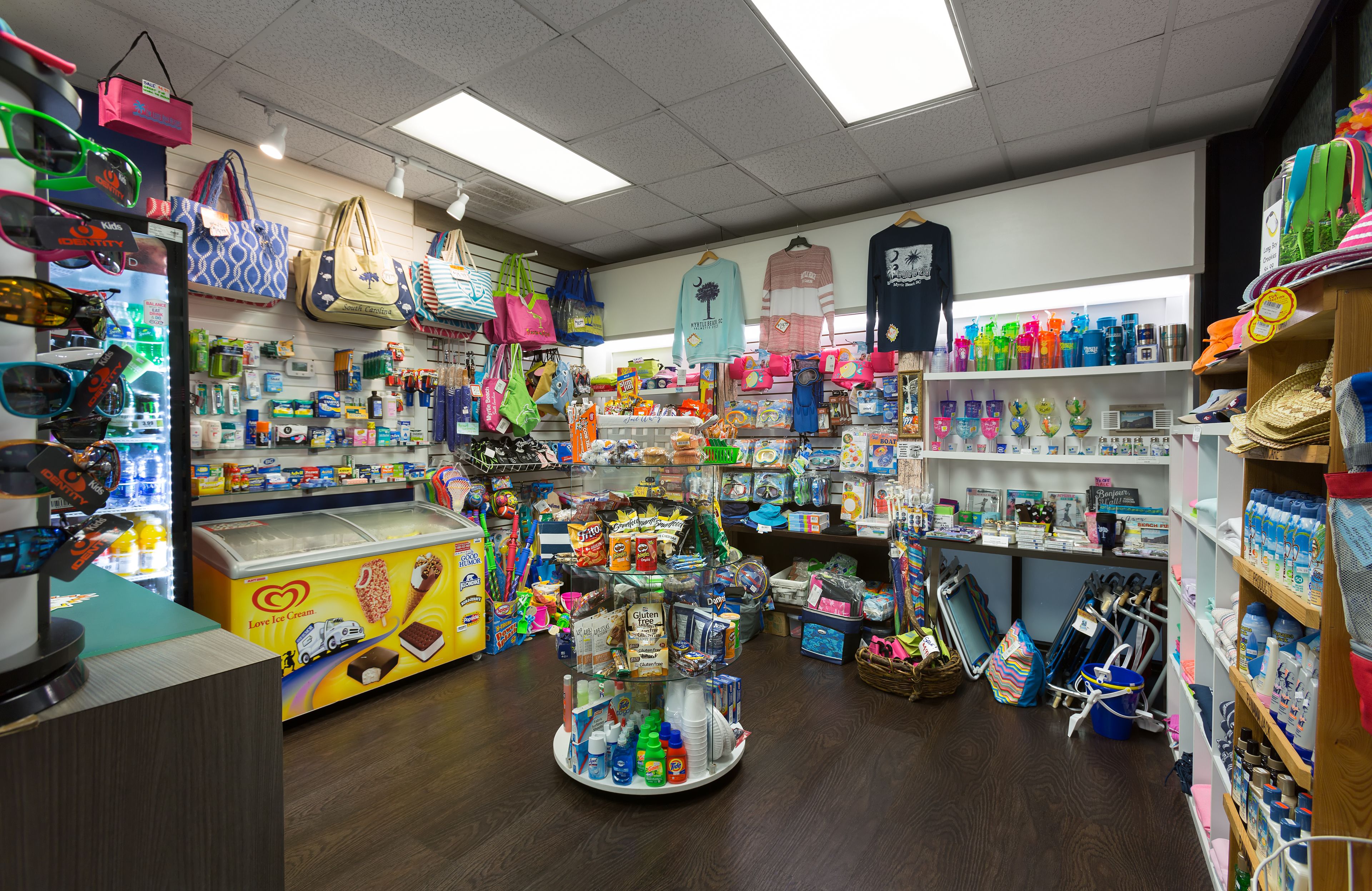 A store with various items on shelves and a central display.