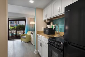 Resort View Junior Suite | Private kitchen | Mini-fridge, microwave, coffee/tea maker