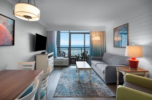 Oceanfront King Suite - Accessible | Living area | Flat-screen TV - Grande Cayman Resort (Myrtle Beach)