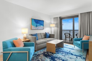 Oceanfront Deluxe Two-Bedroom Condo | Living area | TV