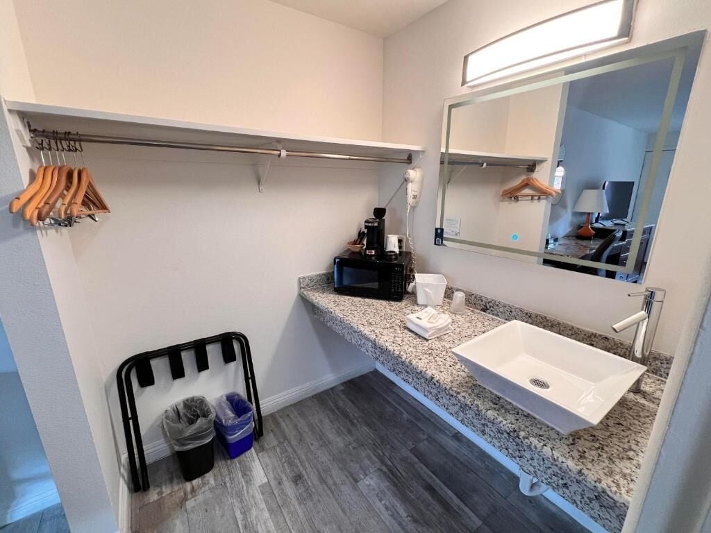 Combined shower/tub, hair dryer, towels, soap
