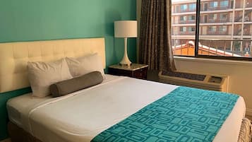 Desk, laptop workspace, blackout curtains, iron/ironing board