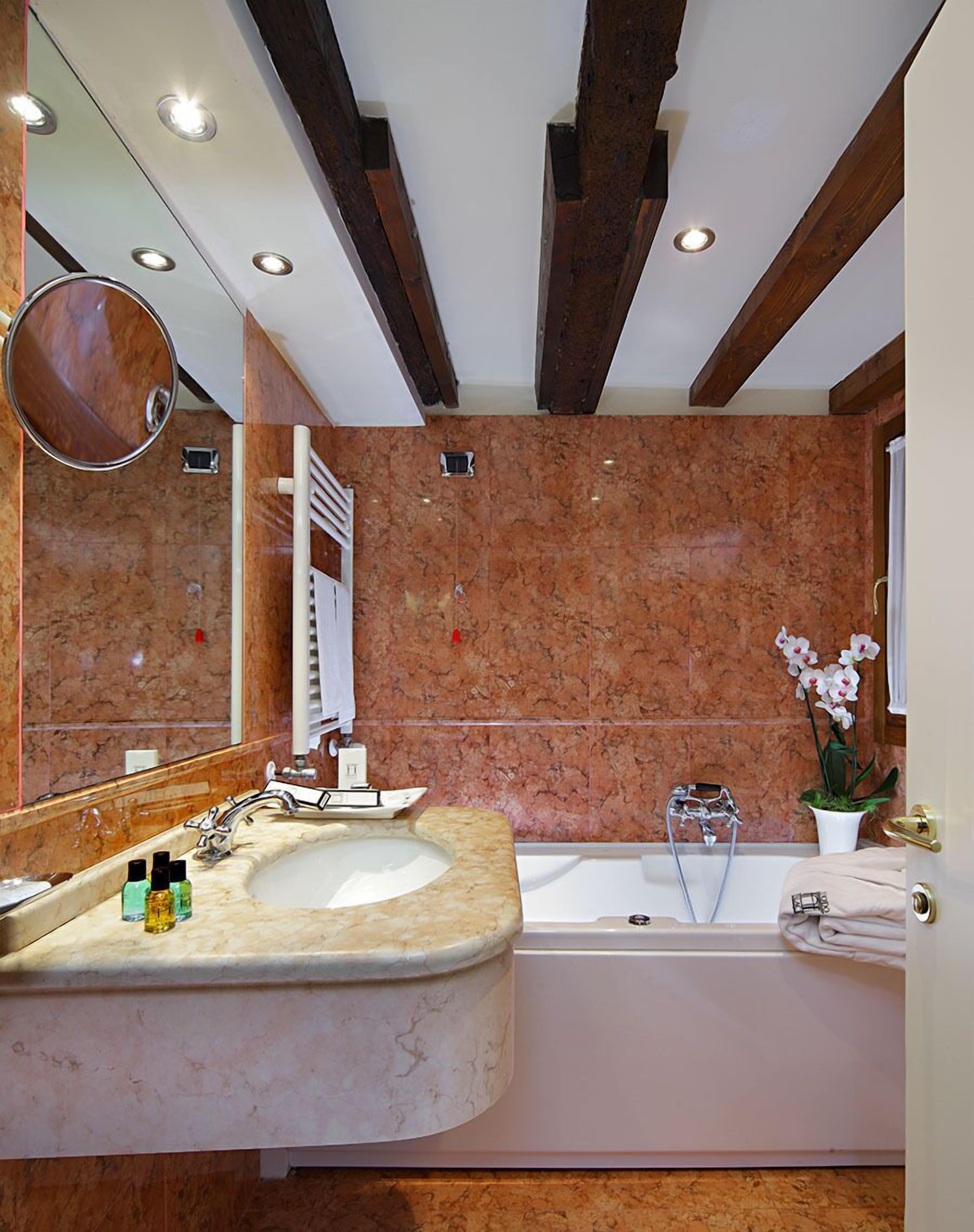 junior room, balcony, canal view | bathroom | hair dryer, bidet, towels