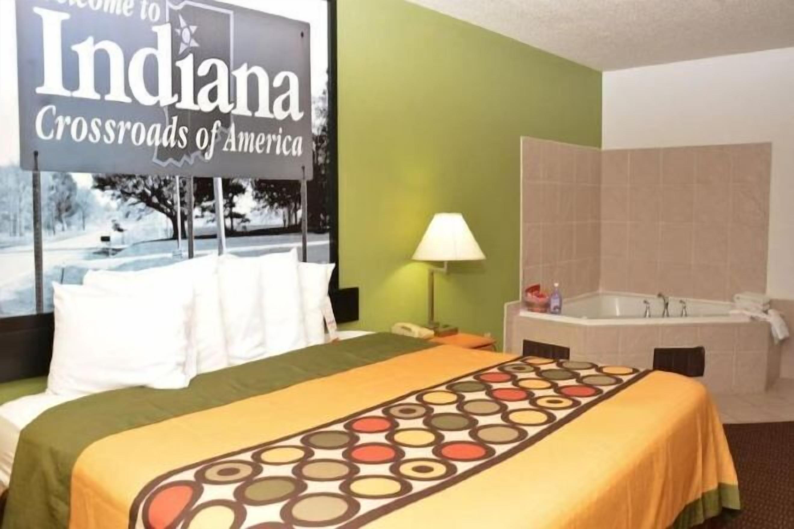 Desk, laptop workspace, blackout curtains, cots/infant beds