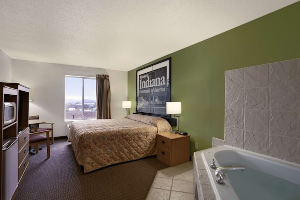 Deluxe Studio Suite, 1 King Bed, Non Smoking, Hot Tub | Desk, laptop workspace, blackout drapes, cribs/infant beds