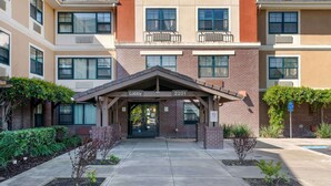 A multi-story building with a lobby entrance labeled "Lobby 2201". - Extended Stay America Suites Sacramento Elk Grove (Elk Grove)