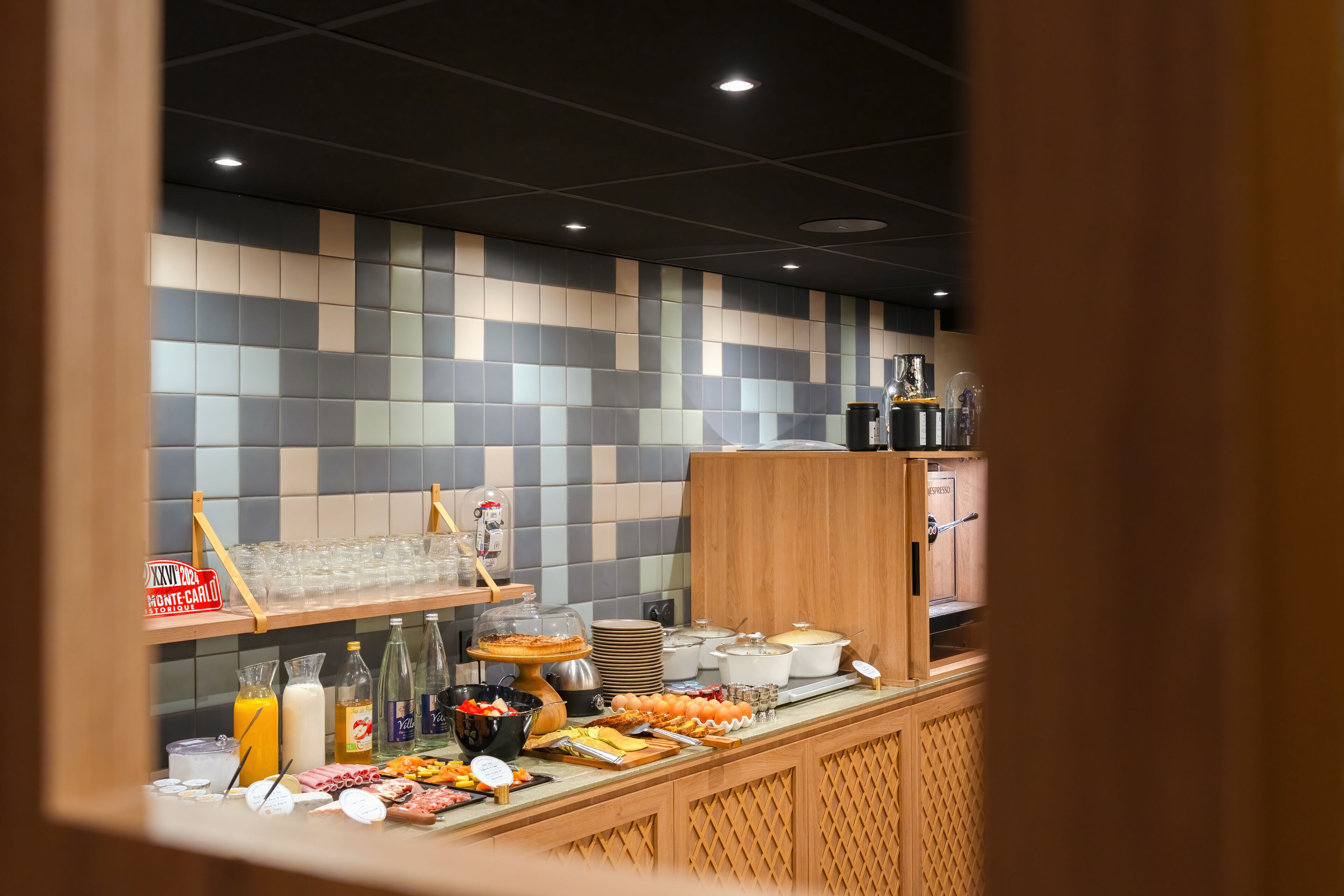 A buffet setup with various food items and beverages.