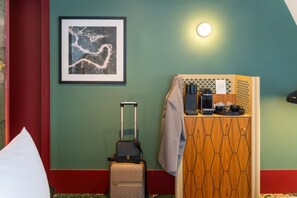 Luxe beddengoed, een minibar, een kluis op de kamer