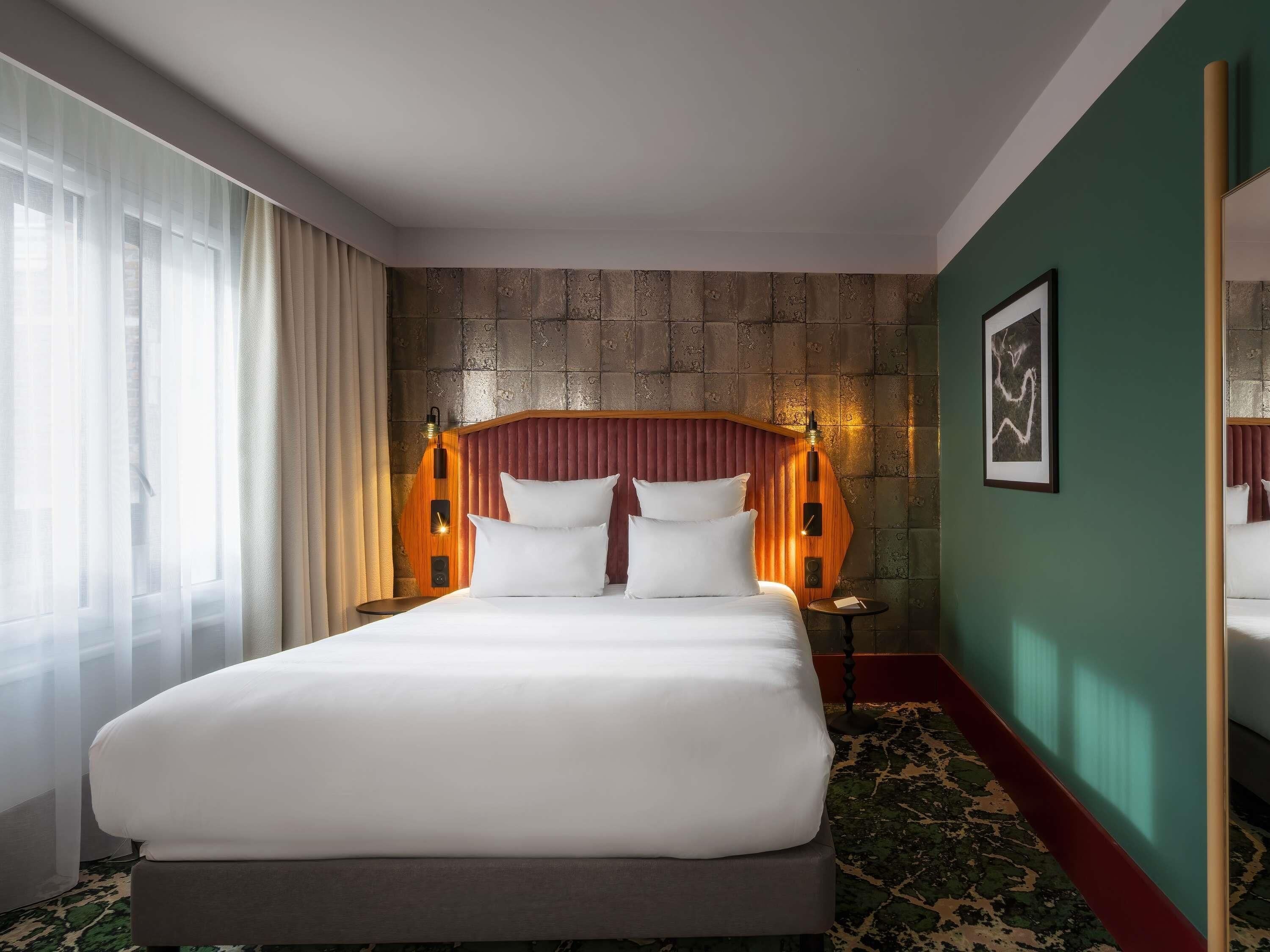 Deluxe kamer, 1 queensize bed | Luxe beddengoed, een minibar, een kluis op de kamer