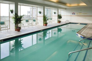 Indoor pool, seasonal outdoor pool, pool umbrellas, pool loungers