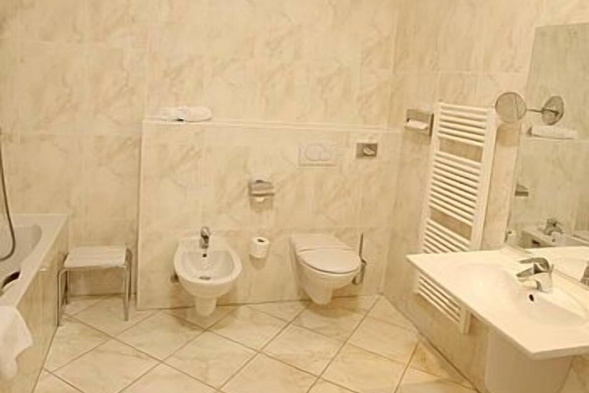 hair dryer, bathrobes, towels