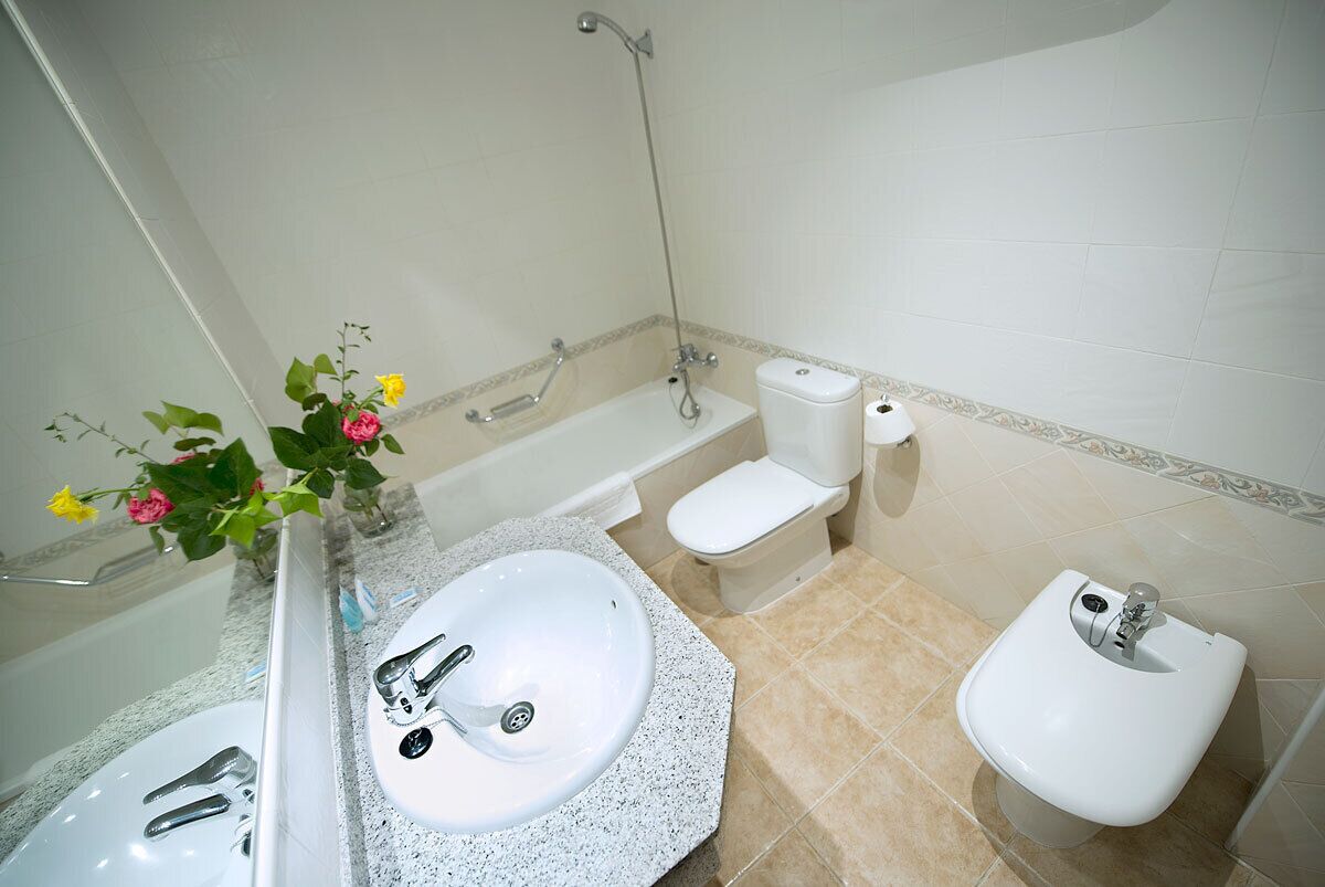 superior double room | bathroom | free toiletries, hair dryer, towels