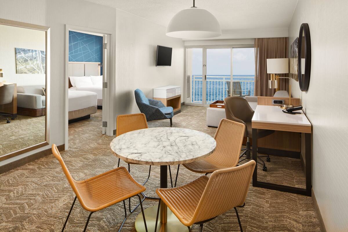 Pillow-top beds, desk, laptop workspace, blackout curtains