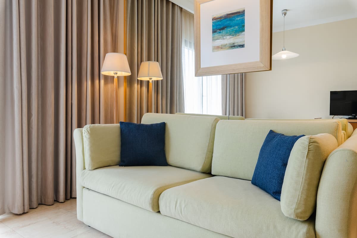 junior suite (family) | living area | 32-inch led tv with satellite channels, tv