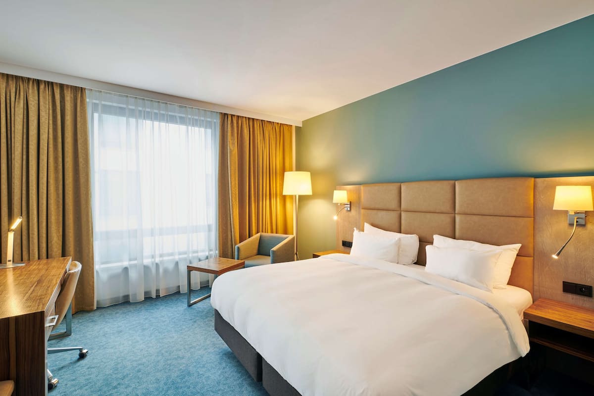 Superior Room | 1 bedroom, down comforters, minibar, in-room safe