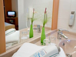 Shower, eco-friendly toiletries, hair dryer, towels