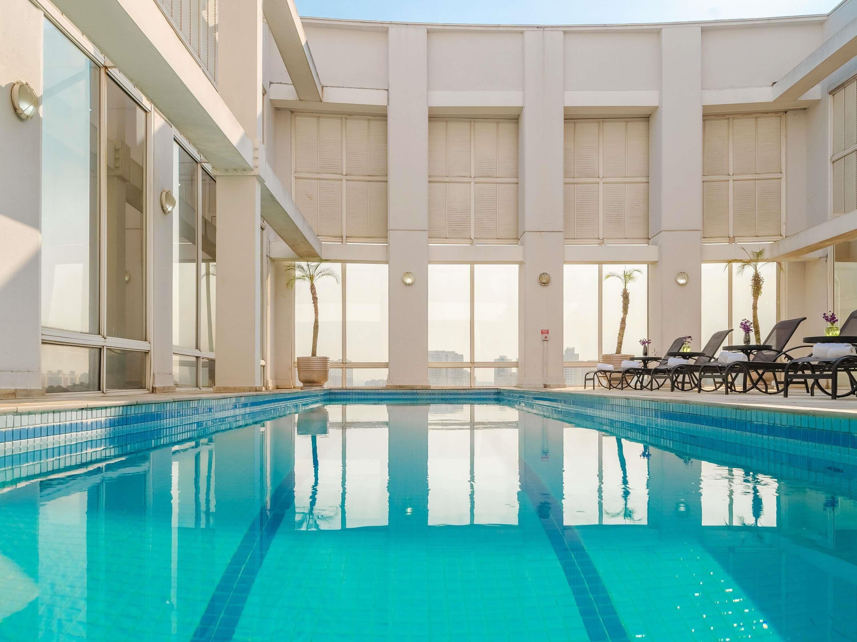 Outdoor pool, open 6:30 AM to 10:00 PM, pool umbrellas, sun loungers