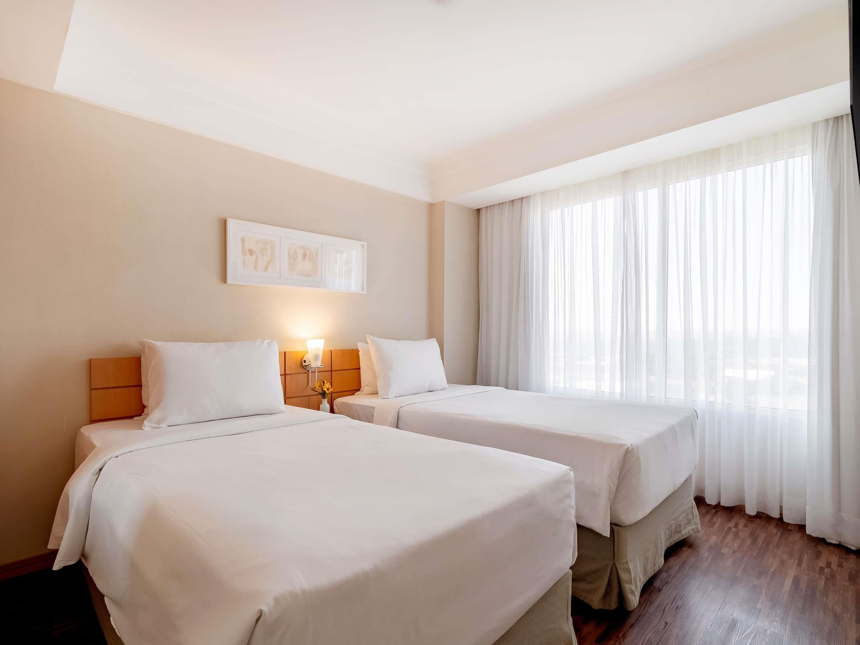 Standard Room, 2 Single Beds | Minibar, in-room safe, desk, blackout curtains