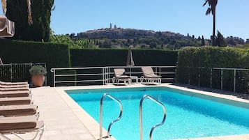 Outdoor pool, pool umbrellas, pool loungers