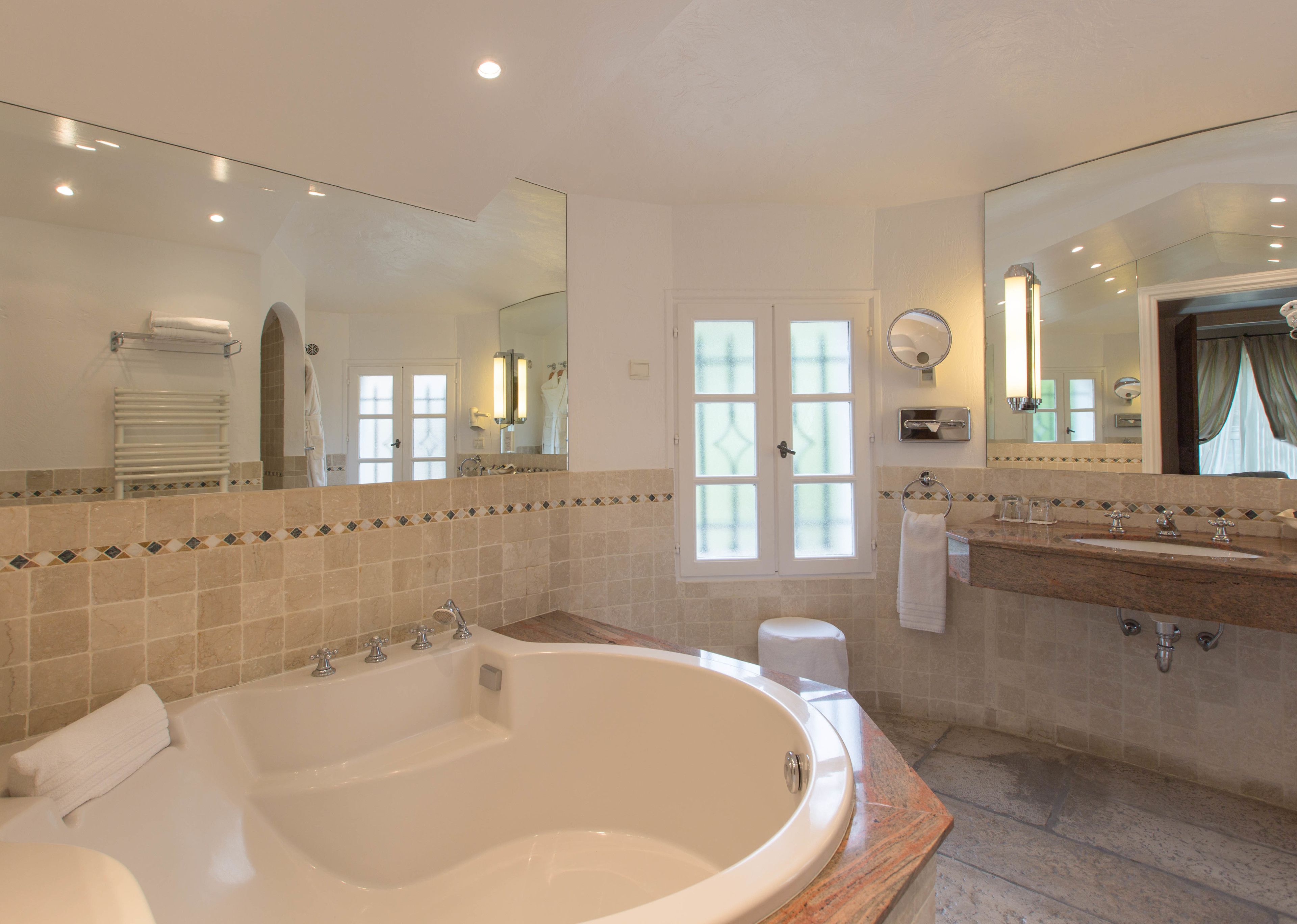 separate bathtub and shower, free toiletries, hair dryer, bathrobes