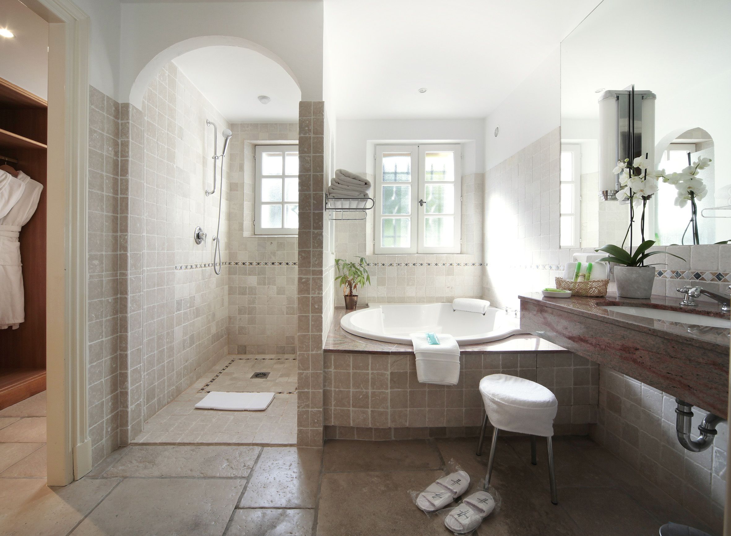 separate bathtub and shower, free toiletries, hair dryer, bathrobes