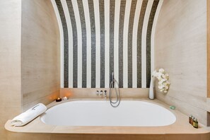 Suite, 1 King Bed | Deep-soaking bathtub