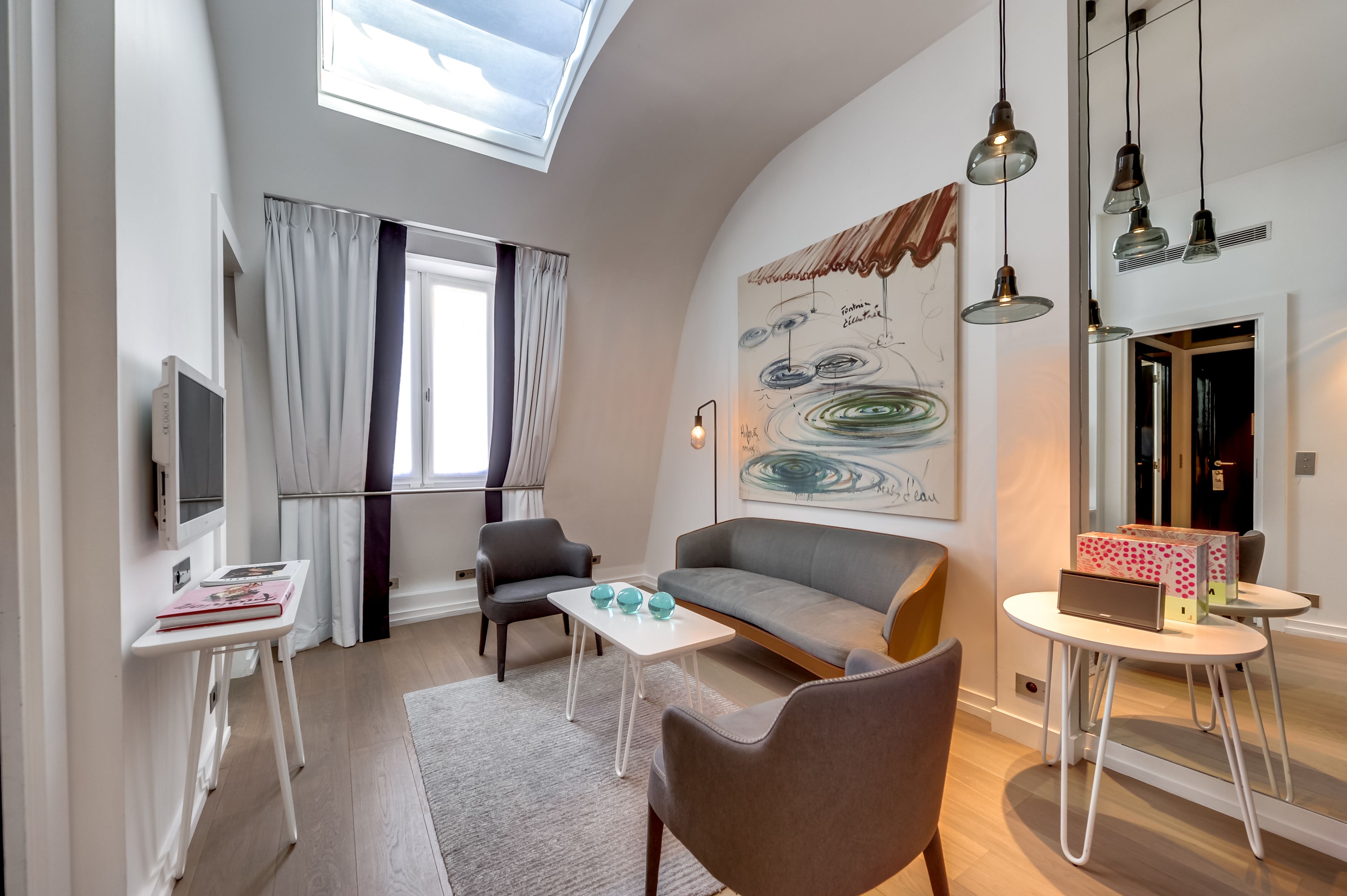 suite, 1 king bed | living area | flat-screen tv, dvd player, ipod dock