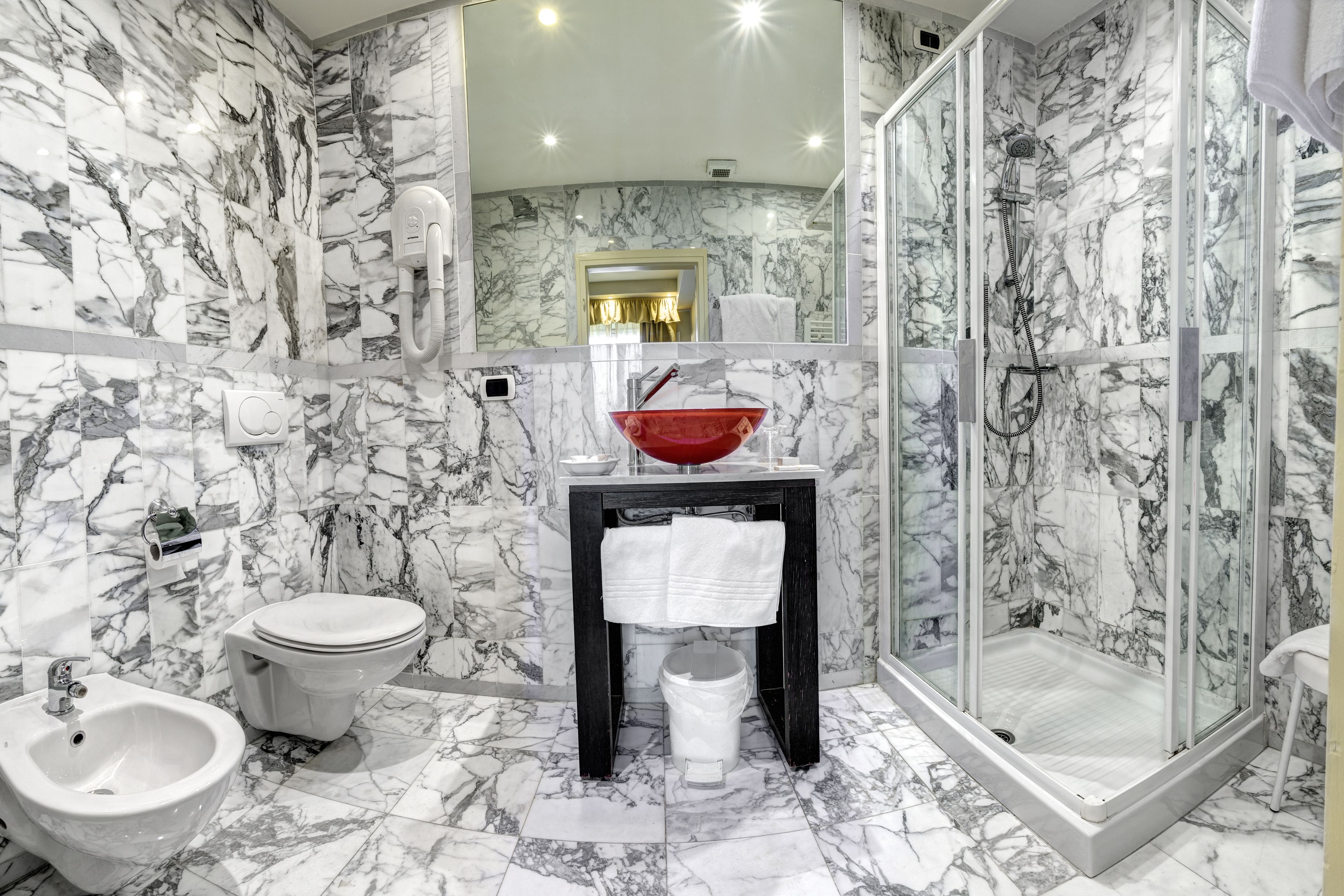 free toiletries, hair dryer, bidet, towels