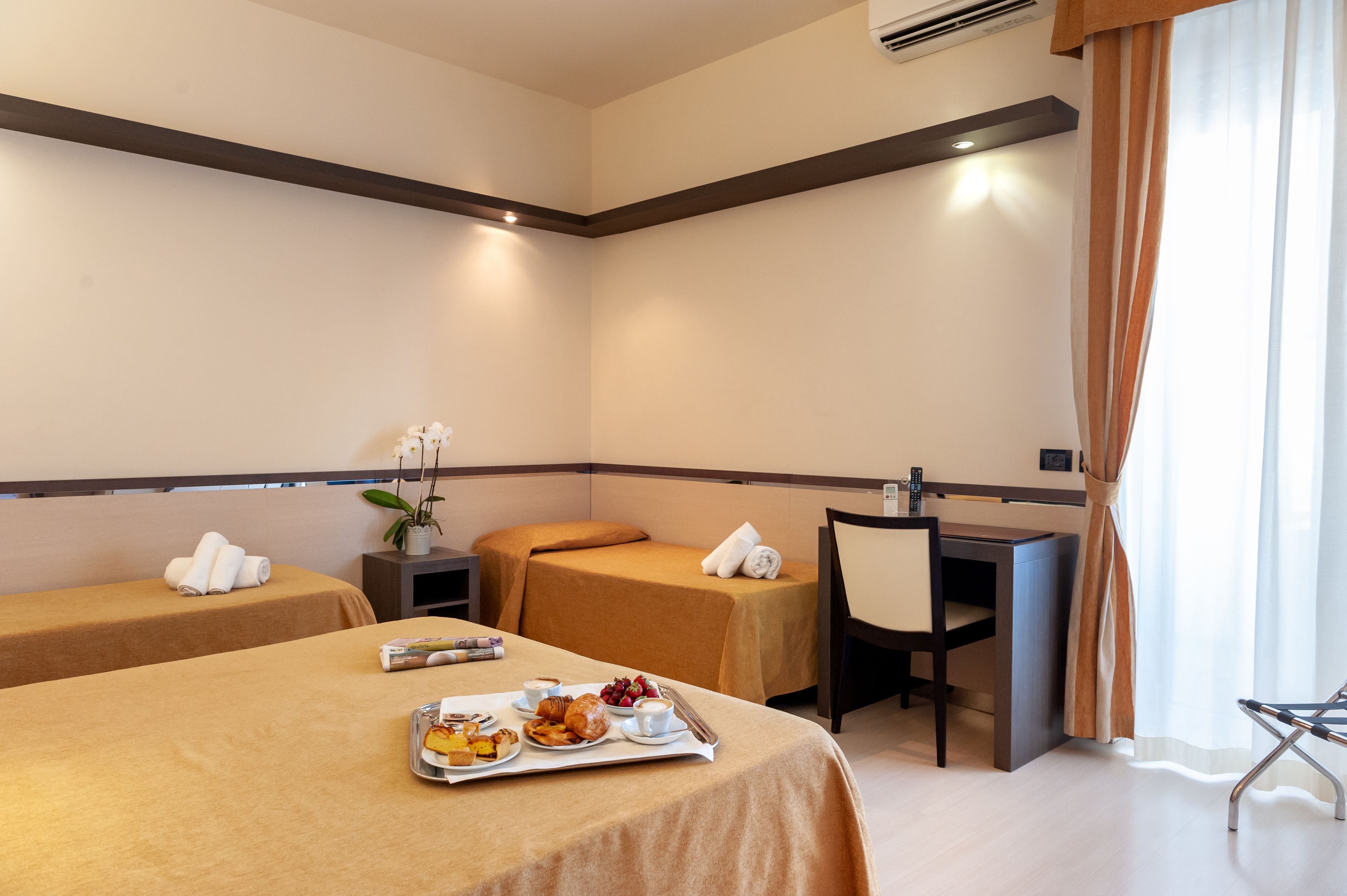 quadruple room | select comfort beds, minibar, in-room safe, desk