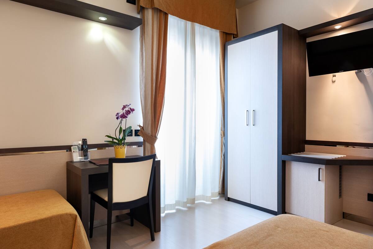 Quadruple Room | Select Comfort beds, minibar, in-room safe, desk