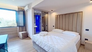 Chambre Confort Double ou avec lits jumeaux | Couette en duvet d'oie, minibar, bureau