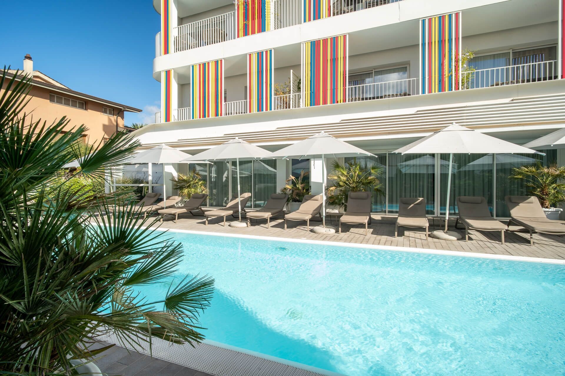 Indoor pool, outdoor pool, open 8:00 AM to 8 PM, pool umbrellas