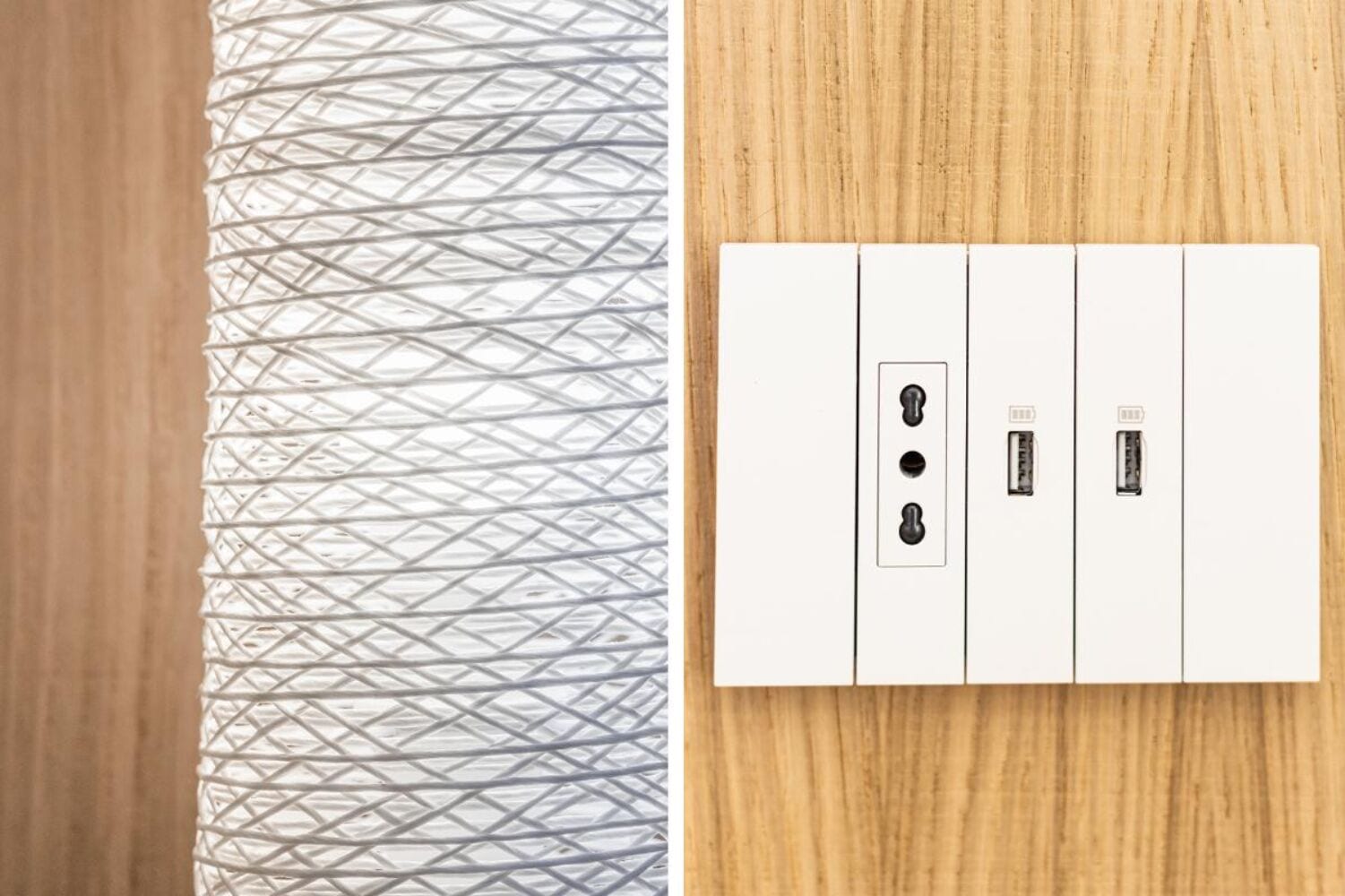 Un panneau électrique blanc, doté de trois prises et de deux ports USB, est fixé à un mur en bois.