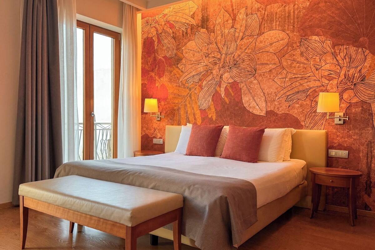 Superior vierpersoonskamer | Italiaanse Frette-lakens, luxe beddengoed, donsdekens, een minibar