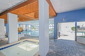 Indoor pool, outdoor pool, pool loungers - Ocean Park Resort by Vacasa (Myrtle Beach)